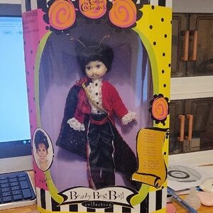 Doll in Red and Black Outfit